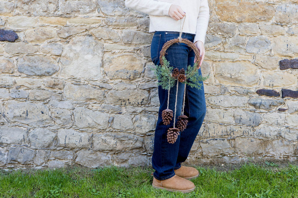 hanging pine cone wreath