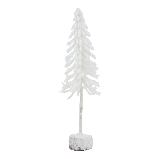 Small White Snowy Tree In Wood Log