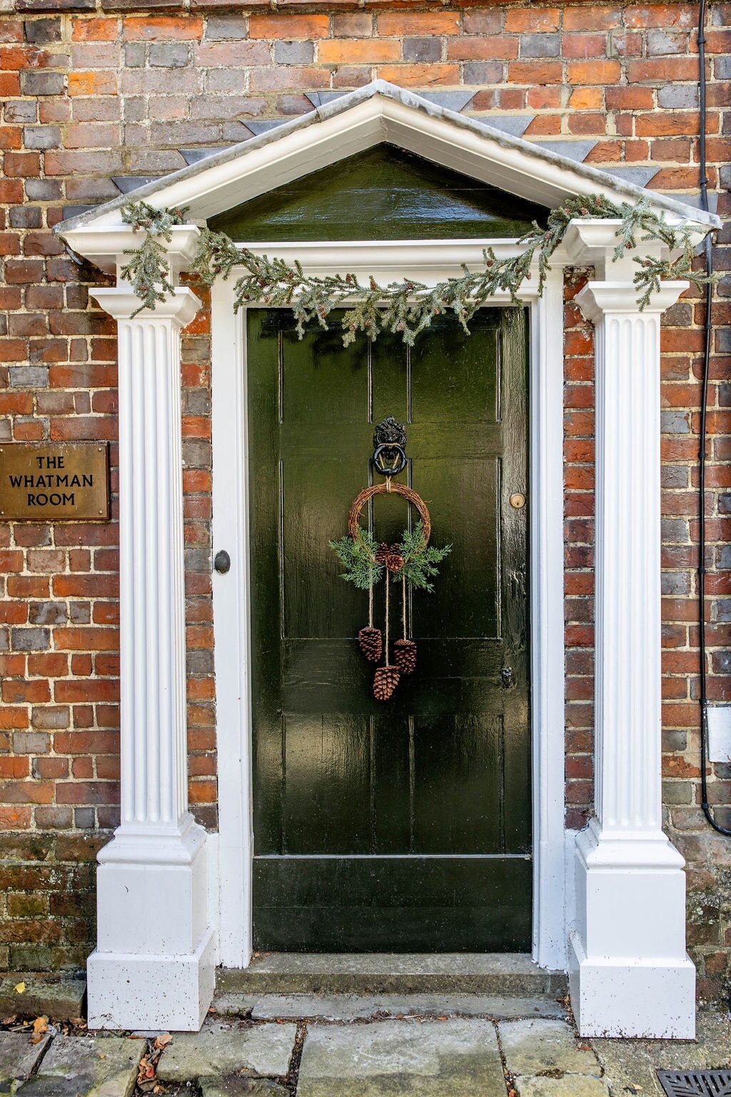 hanging pine cone wreath