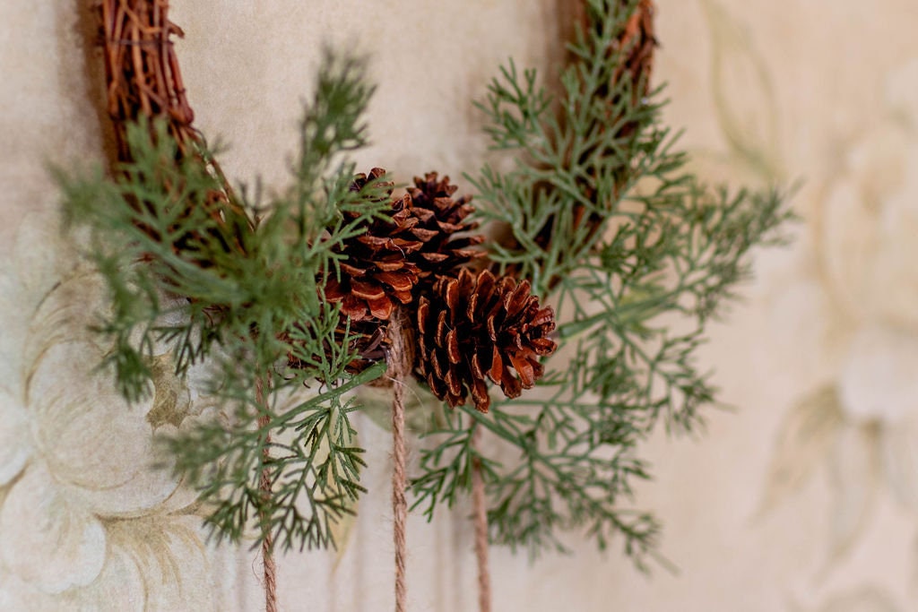 hanging pine cone wreath